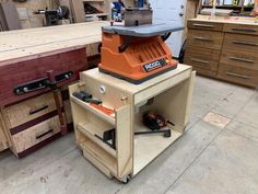 a workbench with tools on it in a shop