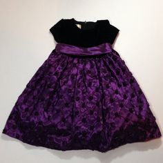 Beautiful American Princess Young Girl's Formal Occasion Dress This beautifully, ornate dress was worn once and comes from a pet-free (ok, so we have a fish) & smoke-free home. Color: Purple & Black Size: 5 FREE DOMESTIC SHIPPING Holiday Formal Purple Dress, Ornate Dress, Formal Occasion Dress, American Princess, Princess Girl, Home Color, Purple Black, Formal Occasion, Occasion Dresses