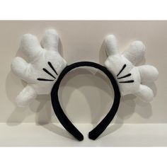 This Adorable Mouse Ears Headband Featuring The Iconic Mickey Mouse White Gloves Is A Must Have For Any Disney Fan! The Unisex Design Makes It Suitable For Both Adults And Children, And The One-Size-Fits-All Ensures A Comfortable Fit. Features An Extra-Wide Headband Covered With Black Plush Fabric, And Plush White Gloves With Embroidered Details. This Contemporary Collectible Will Never Go Out Of Style. The Black And White Color Scheme Is Perfect For Any Outfit, And The Hairband Is An Excellent Extra Wide Headband, Disney Apparel, Mickey Mouse Plush, Mouse Plush, Mouse Ears Headband, Ears Headband, Disney Fan, Black And White Color, Wide Headband