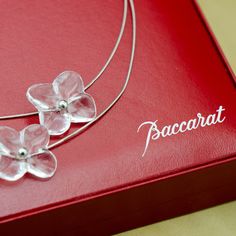 Designed By Baccarat Exquisitely Crafted By Glassmakers In France, This Stunning And Unique Hortensia 3 Flower Necklace Is Sure To Wow! Showcases The Signature Style Of Hand-Blown Baccarat Crystal. Slight Imperfections In The Silver Cable. Measures 15" In Length Includes Original Red Box, Which Has Some Wear/Marks On Inside And Outside. Elegant Clear Jewelry For Formal Occasions, Elegant Formal Clear Jewelry, Luxury Flower-shaped Necklaces For Anniversary, Luxury Flower Necklaces For Anniversary, Luxury Flower-shaped Anniversary Necklaces, Luxury Flower Necklace For Anniversary, Elegant Floral Necklaces For Formal Occasions, Elegant Floral Necklace For Formal Occasions, Elegant Formal Flower Necklaces