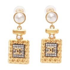 CHANEL A20A gold CC Perfume Bottlefaux pearl drop pendant earrings pair Reference: AAWC/A01065 Brand: Chanel Designer: Karl Lagerfeld Collection: A20A Material: Metal Color: Gold, Black Pattern: Solid Closure: Clip On Extra Details: 2020 Collection. Metal Gilt. Weight 26.2g. Made in: France CONDITION: Condition: Excellent, this item was pre-owned and is in excellent condition. This item is in excellent condition and ready to be loved. Comes with: Style code present (Generic) MEASUREMENTS: Length Pearl Drop Pendant, Chanel Pearls, Chanel Designer, To Be Loved, Drop Pendant, Pearl Drop, Black Pattern, Pendant Earrings, Gold Black