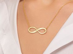 "Introducing our Custom Infinity Necklace--a timeless symbol of endless love and connection. Made with high-quality materials, it exudes both durability and elegance. The infinity symbol represents infinite possibilities, making it a perfect gift for loved ones or a cherished keepsake. The adjustable chain ensures a comfortable fit for all. Embrace the beauty of everlasting love and carry your personalized message close to your heart with this stunning and meaningful accessory.   The Perfect Gif Customizable Infinity Necklace For Gifts, Customized Infinity Jewelry For Gifts, Infinity Shaped Name Jewelry For Gift, Infinity Name Jewelry For Gifts, Infinity Symbolic Jewelry For Gift, Customized Infinity Jewelry For Anniversary Gift, Gold Infinity Jewelry With Name, Symbolic Infinity Jewelry For Gift, Symbolic Infinity Jewelry For Gifts