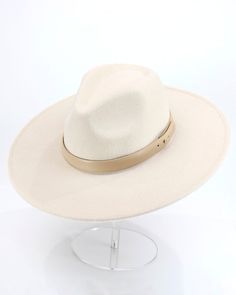 Hats off to the must have accessory of the season! Versatile and timeless, the Wide Brim Felt Hat is ready to be your new favorite go-to this fall and beyond! Why you’ll love it: Women’s wide brim cream felt hat Stiff brim features interior boning to hold and retain shape Adjustable interior band for custom fit Includes 2 removable hat bands selected at random, and are interchangeable with any past G&L hat! Material: 100% polyester Hat bands are selected at random with the purchase of any black, Wide Brim Felt Hat, Hat Bands, Grace And Lace, Felt Hat, By Grace, Hat Band, Hat Shop, Life Size, Wide Brimmed