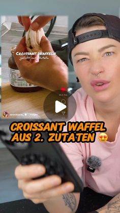 a woman holding a remote control in front of her face with the caption crossant wafel aus 2, zuatan