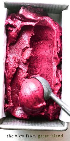 plum and amaretto sorbet in a box with a spoon