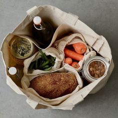 a grocery bag filled with lots of food