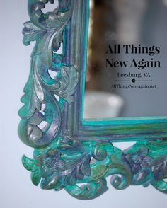 an ornate mirror with the words all things new again on it