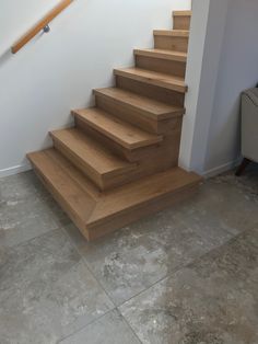 a set of wooden stairs in a home