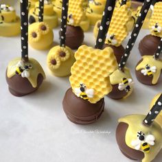 there are many desserts made to look like honeycombs with bees on them