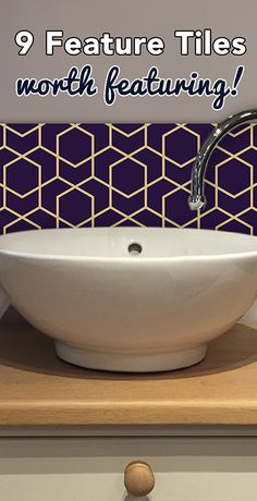 a white bowl sink sitting on top of a wooden counter