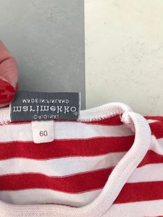 Cute T-shirt from Finnish company Marimekko. This one is if you want to match yourself and your child. 100% cotton. Marked with size 60 cl and fits children up to approx 12 months. Very good condition. Clear colors. Striped in Red and White. ♪♫♬ Don't hesitate to ask for measurements. Cute Striped Cotton T-shirt, Cute Striped Cotton Tops, Marimekko Dress, Red White Stripes, Light Blue Roses, Best Purses, Light Coat, Adidas Gazelle Sneaker, Pink Polka Dots