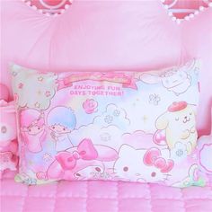 there is a pink bed with hello kitty on it and the pillow says, enjoying fun days together