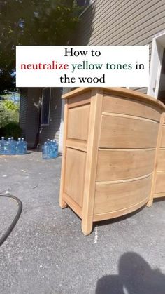 a wooden dresser sitting in front of a house with the words how to neutralize yellow tones in the wood