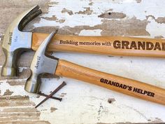 two personalized hammers with the words, building memories with grandpa's help