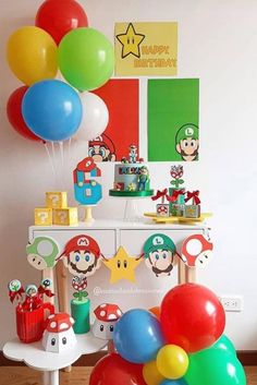 mario birthday party with balloons and decorations