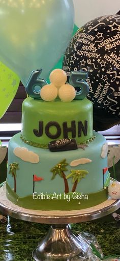 a birthday cake with golf themed decorations and balloons in the background for john's 5th birthday