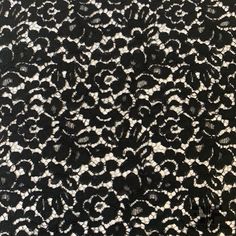 black and white lace fabric with small circles