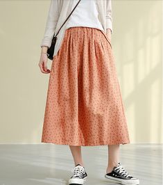 Casual Cotton Linen loose fitting Women's Skirts Casual Spring Skirt With Loosely Fitted Hips, Orange Tiered Skirt For Spring, Orange Flared Skirt For Spring, Bohemian Knee-length Bottoms With Pockets, Casual Orange Lined Skirt, Spring Orange Baggy Bottoms, Casual Orange Pleated Skirt, Orange Summer Skirt With Elastic Waistband, Orange Baggy Bottoms For Spring