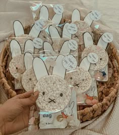 a basket filled with rice krispy treats and bunny ears on top of each other