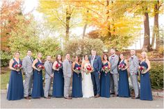 a bride and groom with their bridal party