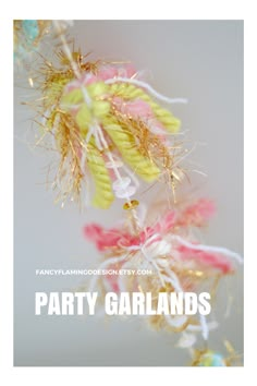 the party garlands are hanging from the ceiling