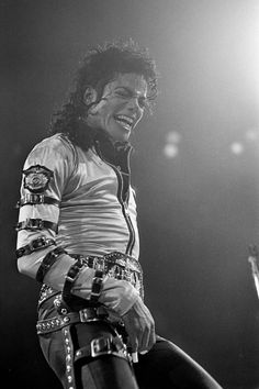 a black and white photo of michael jackson