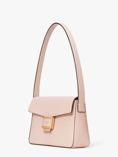 Take a trip back to the '90s (aesthetically speaking) with our new Katy shoulder bag. Made from textured leather this sleek bag keeps you looking cool 24/7. | Kate Spade Katy Medium Shoulder Bag, Mochi Pink Kate Spade Bag, Mochi, Kate Spade New York, Zip Pockets, Kate Spade, Take That, Sleek, Shoulder Bag, Boots