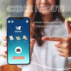 a woman holding up a smart phone with the text check it out above her finger