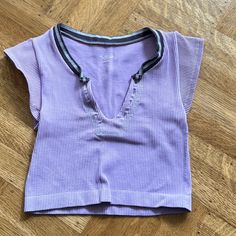 I Originally Bought This Top As A Going Out Top But I Have Never Gotten The Chance To Wear It Out Yet. I Only Tried It On Once. The Fit And Cut Is Everything And The Fabric Is Butter Smooth. Urban Outfitters V-neck Crop Top, Sporty Cotton V-neck Crop Top, Y2k Seamless Summer Tops, Urban Outfitters Purple Sleeveless Top, Urban Outfitters Seamless V-neck Top, Urban Outfitters Cotton V-neck Tank Top, Urban Outfitters Seamless Summer Tops, Urban Outfitters Ribbed Summer Tops, Urban Outfitters Purple V-neck Top