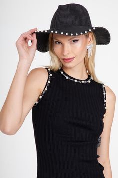 Add a touch of luxury and playfulness to your wardrobe with our Black Pearl Hat! Made from black straw, this hat features a unique and stylish embellishment of ivory pearls around the rim. Perfect for any occasion, this hat will make you stand out in the most fashionable way. Chic Fedora Party Hat, Evening Fedora Straw Hat, Trendy Hat For Kentucky Derby Party, Trendy Hats For Kentucky Derby Party, Chic Spring Fedora Mini Hat, Trendy Kentucky Derby Party Hat, Elegant Mini Hats With Curved Brim For Vacation, Trendy Mini Hats For Summer Party, Trendy Summer Party Sun Hat