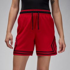 Unmistakably iconic, the Jordan Woven Diamond shorts have reclaimed the spotlight. Constructed from a relentless four-way stretch-woven fabric and amped with moisture-wicking magic, this pair ensures you stay cool, dry, and stylish. No matter if you're dominating the court or strutting your stuff off-court, from sinking free throws to tackling the checkout line, these shorts guarantee an air of freshness that's locked in—a statement not to be ignored. Stretch-woven fabric feels lightweight, dura Red Nylon Shorts, Sporty Red 4-way Stretch Bottoms, Sporty Red Bottoms With 4-way Stretch, Red Sporty Athletic Shorts With Go-dry Technology, Red Sporty Go-dry Athletic Shorts, Red Go-dry Athletic Shorts, Red Go-dry Sportswear Shorts, Sporty Red Nylon Athletic Shorts, Red Nylon Athleisure Shorts