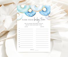 a blue and white floral themed baby shower game