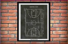 a framed basketball court on a brick wall with the words basketball court written in chalk