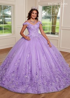 Look picture-perfect in this embroidered lace applique long cold shoulder dress with A-line skirt by Rachel Allan RQ1126. Glitter tulle quinceanera ball gown features a V-neckline, iridescent appliques, 3D butterflies, beading, off-the-shoulder straps, and lace-up back closure. Applique Cold Shoulder Quinceanera Dress by Rachel Allan RQ1126 Rachel Allan Carmina Collection: Fall 2023 Style Number: RQ1126 Fabric: Beading, Tulle, Glitter Tulle, Applique, 3D Butterflies Please note: There may be a l Lavender Ball Gown, Quinceanera Collection, Mary's Bridal, Debutante Ball, Dresses Quinceanera, Rachel Allan, Quinceanera Dress, 16 Dresses, 3d Butterflies