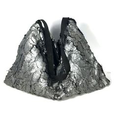 "Silver Faux Fur Hobo Bag Silver Hobo Bag Silver Faux Fur Shoulder Bag Faux Fur Purse Black and Silver Vegan Fur Purse Vegan Fur Handbag High end...high quality...so soft...highly unique silver faux fur hobo bag Fully-lined in black cotton quilted fabric Interior pockets, center magnetic closure Great for work, workout, play or travel Approximate Measurements: 20\" wide across the bottom 14\" high ...so chic...punk...goth...fits many different styles STRAPS Same faux fur as bag, 17\" drop only ( Silver Tote Bag With Leather Handles, Silver Travel Bags With Leather Handles, Silver Bags With Leather Handles For Shopping, Silver Hobo Tote Bag With Removable Pouch, Elegant Reversible Tote Shoulder Bag, Evening Hobo Tote Bag, Large Capacity Evening Hobo Pouch Bag, Reversible Shoulder Bag For Errands, Chic Black Reversible Bags