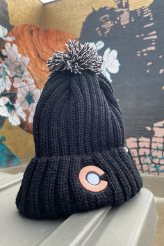 Fleece Lining Callout! This Colorado Flag beanie has a nice, soft fleece lining on the inside providing maximum warmth and comfort when you are out enjoying the beautiful Colorado outdoors this winter! But this Colorado Flag beanie isn't just about comfort, its also about style. The Colorado Flag is embroidered in a beautiful ROSE GOLD and silver embroidery. The icing on the cake is the rosy pink strands throughout the pom. Nothing is going to keep you more warm and stylish this winter. Rosy Pink, Gold And Silver, Beautiful Roses, Rose Gold, Gold