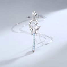 Cast your own spell with this charming wand pendant.This personalized necklace ticks all the boxes for what is deemed an ideal piece to adorn and dress up a sophisticated ensemble. Its daintiness lends a look a hint of romance and femininity.Chain Type: Weight: 5.06 gHeight: 44.8 mmMaterial: Plating Color: Silver Magical Silver Pendant Necklace, Magical Silver Charm Necklaces As Gift, Magical Silver Charm Necklaces For Gift, Silver Pendant Charm Necklace With Magical Style, Magical Sterling Silver Necklace As A Gift, Magical Sterling Silver Round Pendant Necklace, Sterling Silver Magical Round Pendant Necklace, Magic Wand, Necklace Online