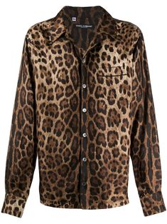 Brown silk leopard print shirt from Dolce & Gabbana featuring classic collar, front button fastening, long sleeves, chest patch pocket and leopard print. | Dolce & Gabbana Leopard Print Shirt New York Streetwear, Dolce And Gabbana Shirts, Leopard Pajamas, Silk Pajama, Leopard Print Shirt, Brown Silk, Printed Shirt Dress, Dolce E Gabbana, Silk Pajamas