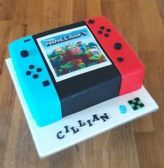 a cake made to look like an old video game console on top of a wooden table