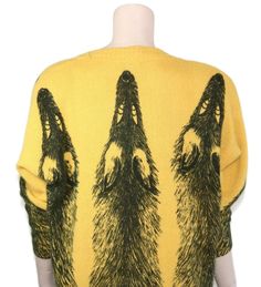 "This 80s or 90s-era Krizia sweater features a soft fuzzy lambswool and angora blend knit, tapered sleeves with large batwing-esque shoulders and chunky shoulder pads, and a cheeky novelty \"fox stole\" design worthy of Moschino. Sweater is unlined, pullover style. Fits size medium, large, or xl depending on desired fit (please check measurements below). Accessories not included. Payment plans available. Approximate Flat Measurements: Multiply times 2 for bust, waist, and hip measurements. For b Oversized Yellow Sweater For Winter, Oversized Mustard Long Sleeve Sweater, Oversized Long Sleeve Mustard Sweater, Mustard Oversized Long Sleeve Sweater, Yellow Oversized Cozy Sweater, Oversized Yellow Cozy Sweater, Oversized Cozy Yellow Sweater, Yellow Relaxed Fit Winter Sweater, Cozy Oversized Yellow Sweater