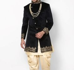 Handcrafted Designer Sherwani for groom made from the finest fabric will make you feel like a king on the happiest & most important day of your life. you can customize it according to your measurement as the fitting make it more beautiful to wear. COST INCLUDES SHERWANI,PANTS & STOLE(Dupatta) Black Sherwani With Naqshi For Festivals, Black Dabka Sherwani For Groom, Black Sherwani For Groom For Festivals, Black Sherwani For Groom On Eid, Black Sherwani For Groom At Festivals, Black Bandhgala For Groom With Traditional Drape, Traditional Black Kurta For Groom, Traditional Drape Black Kurta For Groom, Black Bandhgala For Groom Diwali Occasion