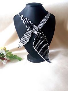 "Necklace-scarf \"Business Lady\". Classic black and white colors. Beaded tie tied bow. Beaded jewelry A gift for her Black necklace Delicate handmade jewelry Necklace made of Czech beads. Necklace circle 55 cm or 21,65 inches. If you need another color or length, email me. If you have any questions, email me. Thank you for your interest in my work." Beaded Tie, Business Lady, Necklace Scarf, Beaded Scarf, Tie Necklace, Scarf Vintage, Handmade Jewelry Necklace, Bib Necklaces, Black Necklace