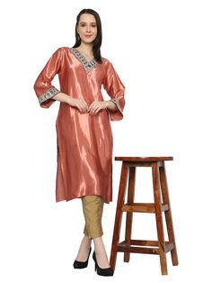 Elevate your wardrobe with our exquisite Pink Gotta Patti Work Kurta. Hand-embroidered on the front, this piece exudes elegance and charm. Crafted from sustainable Mashroo cotton silk Kutchi material, it not only adds style to your ensemble but also contributes to a more eco-conscious lifestyle. Each piece is a testament to skill empowerment for artisans, ensuring that their craftsmanship is celebrated and sustained. This royal, timeless garment is perfect for any occasion, be it a party, weddin Festive V-neck Kurta With Zari Work, Festive V-neck Kurta For Party, Festive V-neck Self Design Kurta, Semi-stitched Art Silk Churidar, Long Sleeve Churidar With Mirror Work, Art Silk Palazzo Set With Straight Kurta, Festive Chanderi V-neck Kurta, Festival Dabka Work Tunic, Festive V-neck Kurta For Diwali