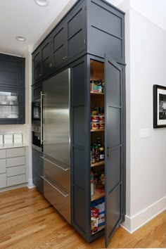 the pantry in the kitchen is built into the wall