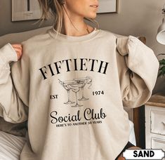 "Are you or someone you know turning 50 soon? Celebrate this milestone birthday in style with our Fiftieth Birthday Club Est 1974 shirt! This unique and eye-catching shirt is the perfect gift for anyone reaching their half-century mark, or a great addition to any 50th birthday party. **PLEASE NOTE THERE ARE VARIOUS STYLES AND SIZES AVAILABLE IN LISTING SO PLEASE MAKE SURE YOU HAVE READ THE INFORMATION AND SIZE CHARTS IN PICTURES BEFORE PLACING ORDER**  How To Order  - Please make sure you have looked at all sizes and color charts. - Select from the various styles sizes and colors from scroll down menus. - Click \"Add to cart\" button. You can turn back and add more items of different size and color.  Sizing  ✺ Sizing is unisex  ✺ For adults, size runs like men's, though not overly large. M Luxury Bachelorette, Baseball Girlfriend, 30th Birthday Shirts, Birthday Sweatshirt, Last Ride, Cocktail Club, Baseball Mom Shirts, Club Sweatshirts, Group Shirts