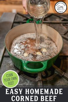 a person pouring water into a pot filled with food