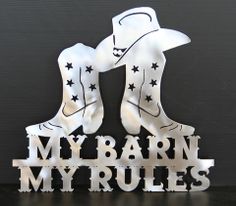 a metal sign that says, my barn my rules with two cowboy boots on it