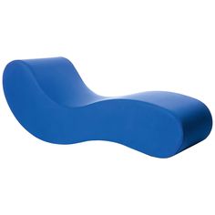 a blue lounge chair sitting on top of a white floor