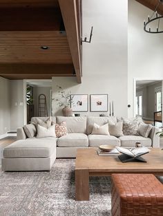 a living room filled with lots of furniture