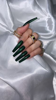 The most stunning shade of green you will ever set eyes on. With extreme sparkle in a deep shade of forest green Shown in XL coffin Nail glue is included Prep kit sold separately Emerald Acrylic Nails Coffin, Extreme Square Nails, Crazy Green Nails, Square Extreme Nails, Viridian Green Nails, Cute Xl Nails, Dark Emerald Nails, Dark Emerald Green Nails With Gold, Coffin Extreme Nails